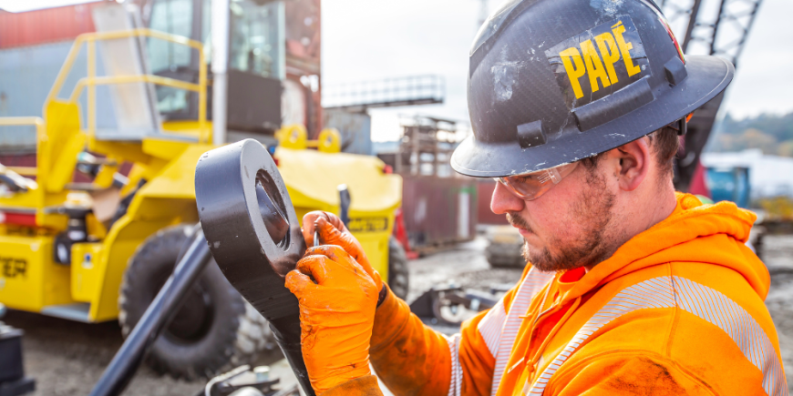Pape technician performing preventive maintenance on equipment to maximize uptime and fleet reliability.